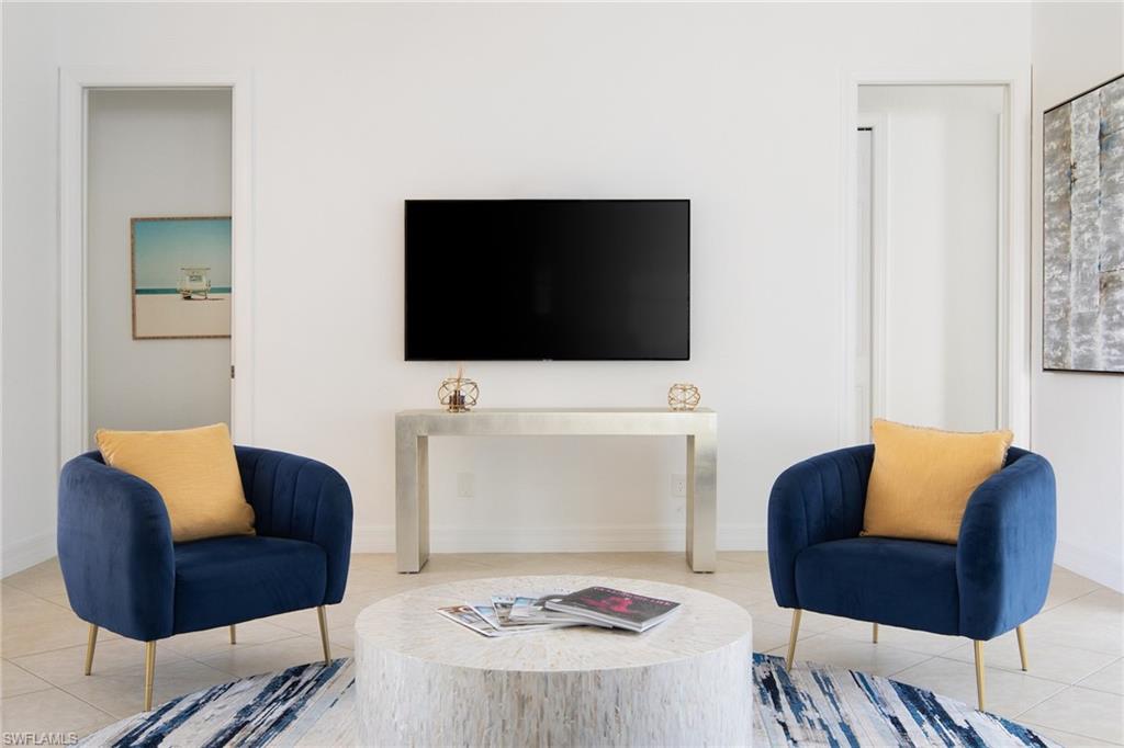 Tiled living area with baseboards