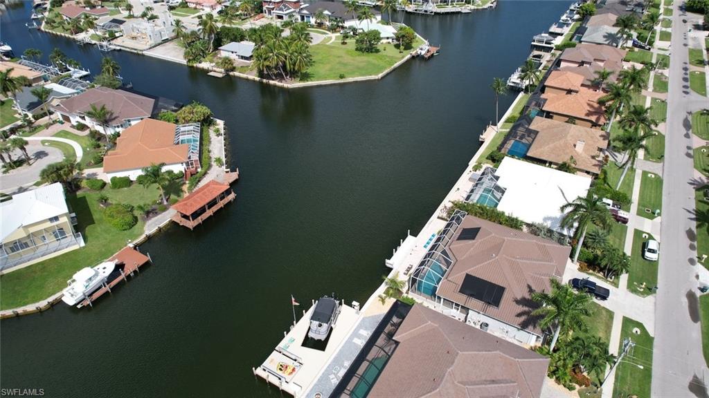 Aerial overview of property's location featuring nearby suburban area