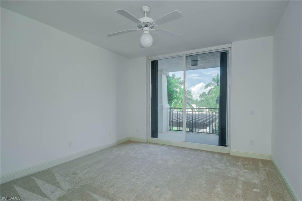 NEW Carpeted GUEST Bedroom with floor to ceiling windows and ceiling fan