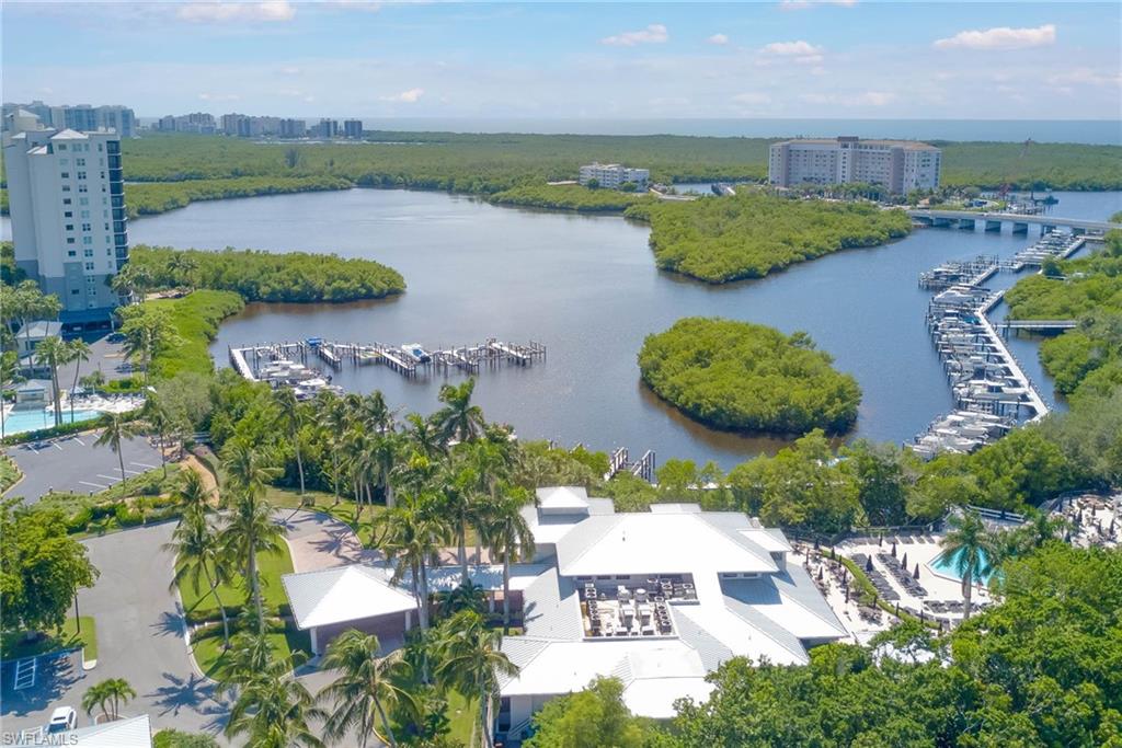 View of urban area featuring numerous boat docks and a nearby body of water
