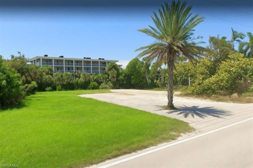 cleared lot with a.i. grass/tree