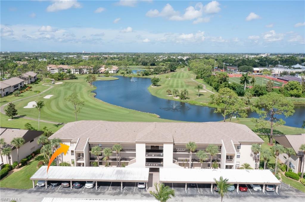 Bird's eye view of a large body of water and a local golf course