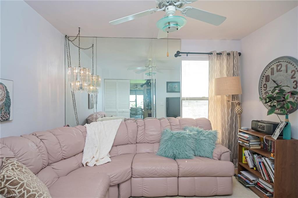 Living area with carpet flooring