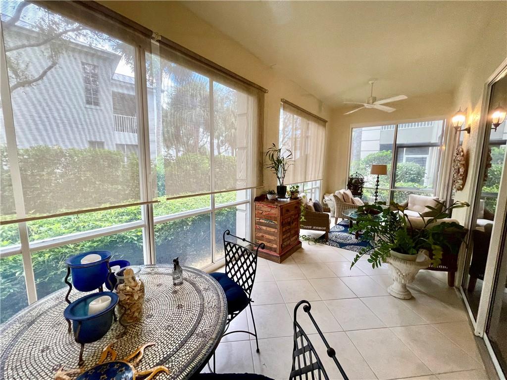 Sunroom featuring tile patterned flooring