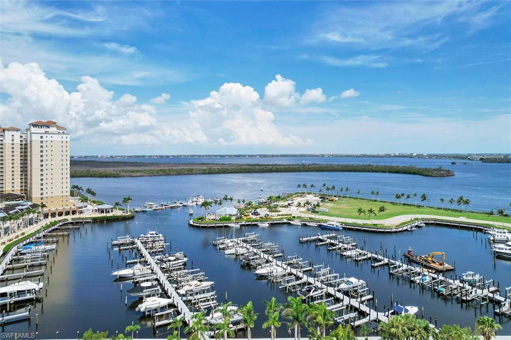 Water view featuring numerous boat docks