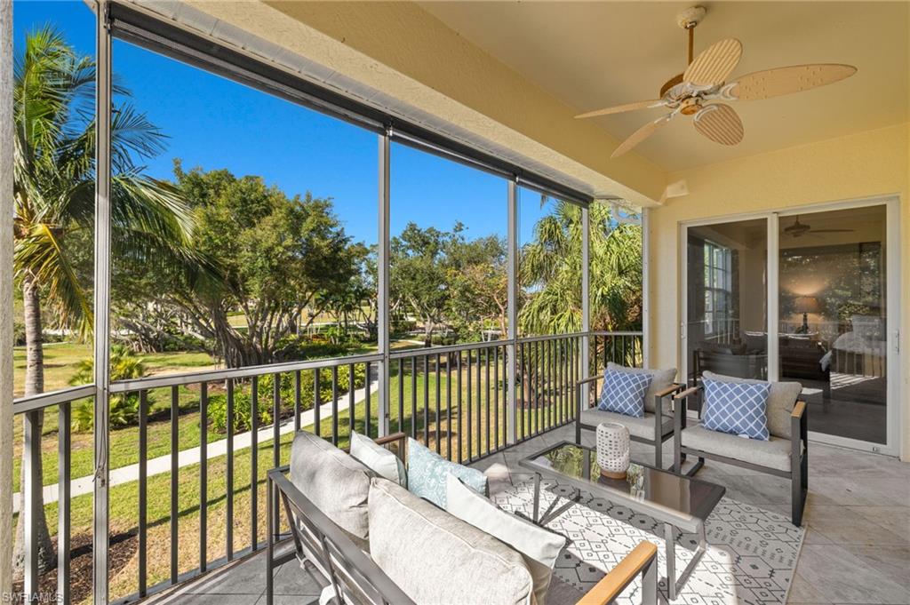 Sunroom featuring ceiling fan and outdoor lounge area