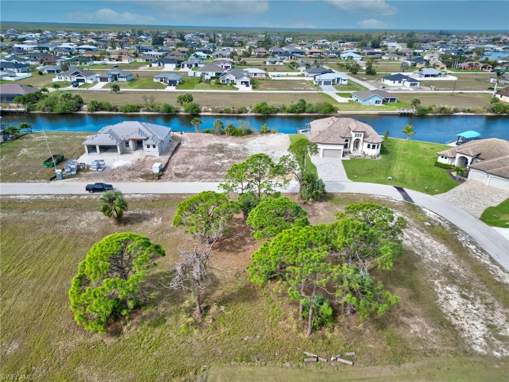 Aerial view of residential area with a nearby body of water