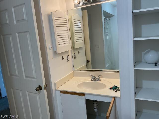 Full bathroom featuring vanity