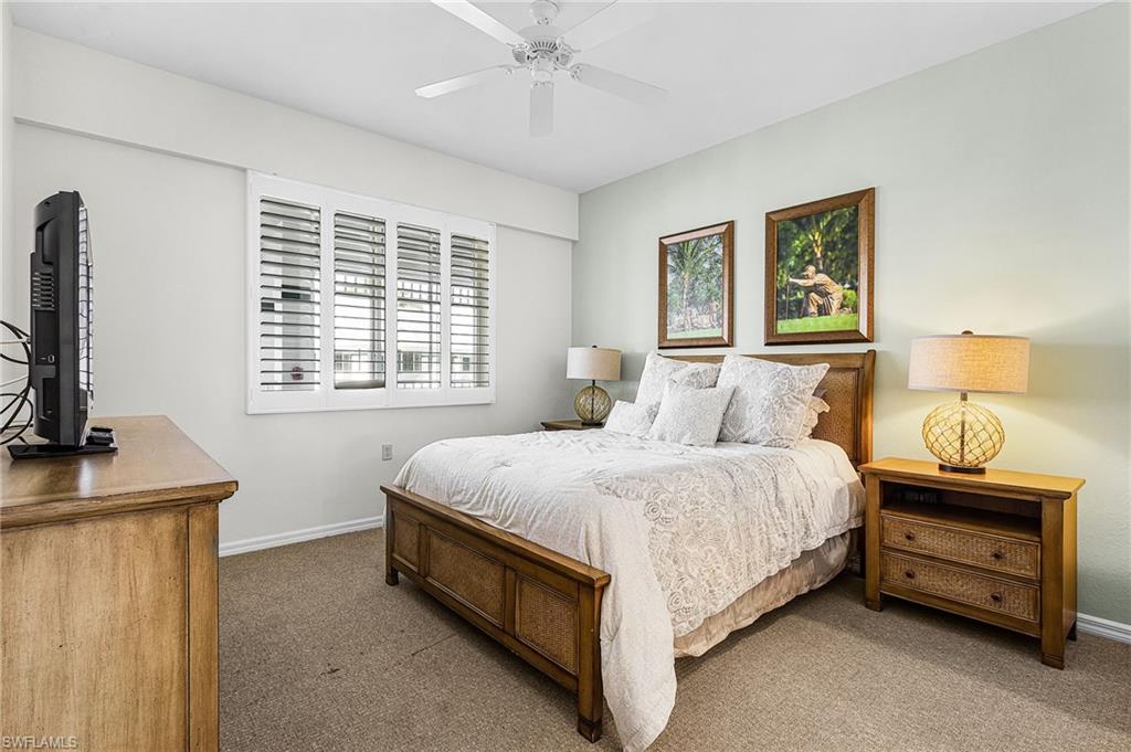 Bedroom with carpet floors and a ceiling fan