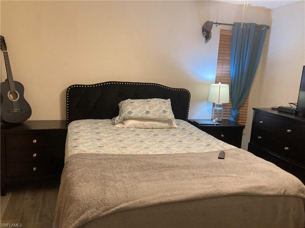 Bedroom featuring wood finished floors