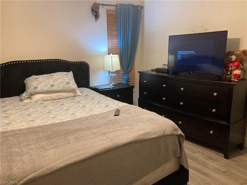 Bedroom featuring light wood finished floors