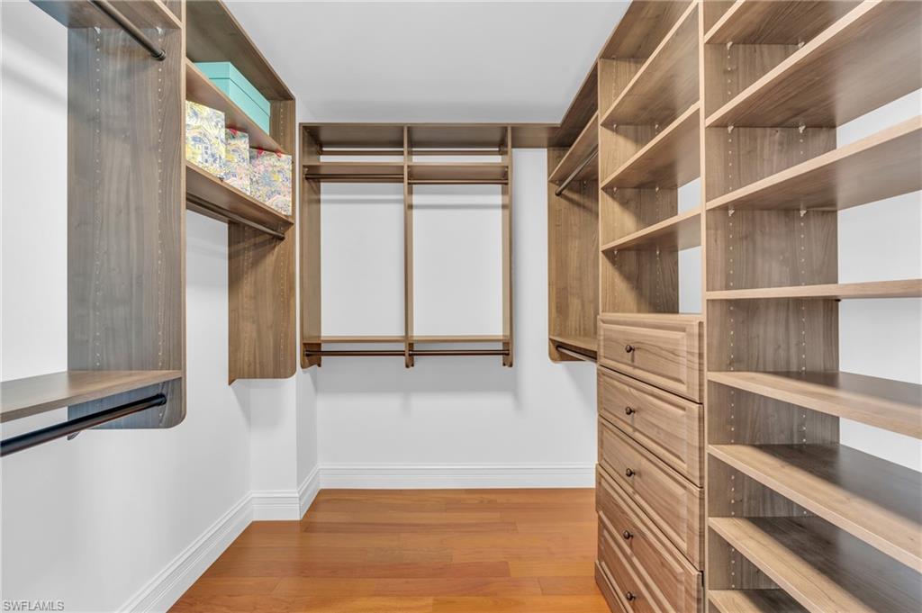 Walk in closet featuring light wood-type flooring