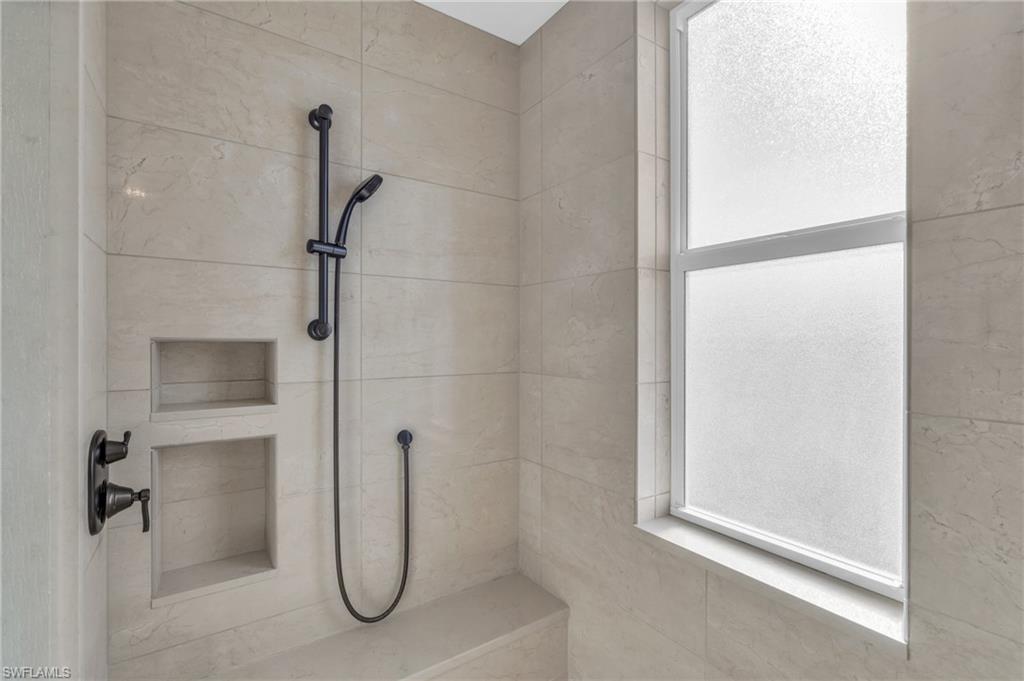 Bathroom with a tile shower