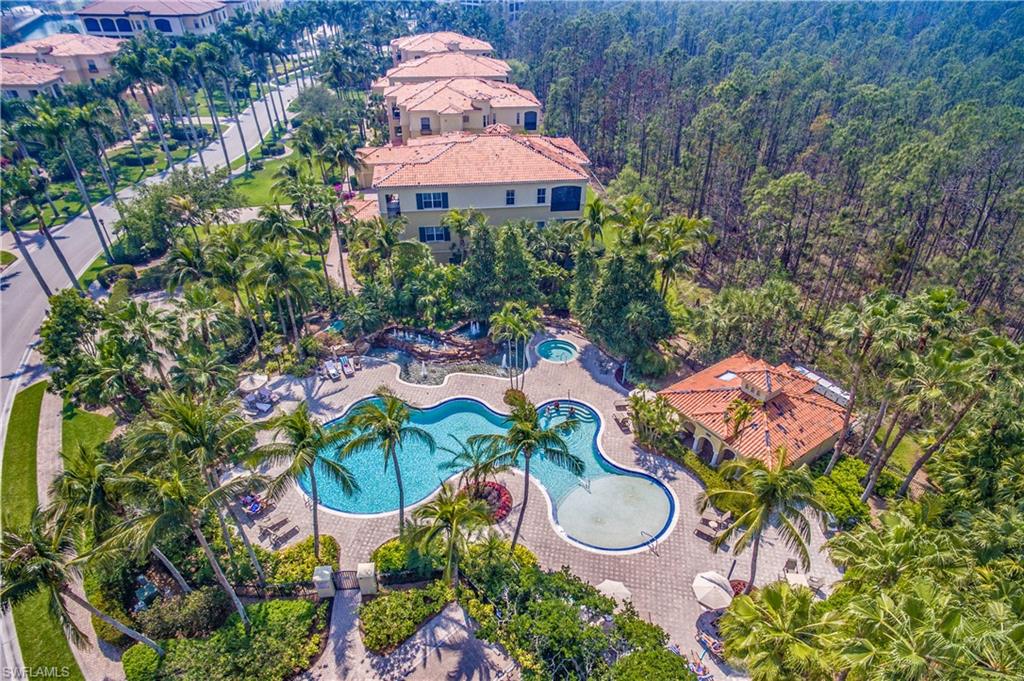 Poolside gas grills, kitchen, pool baths & umbrellas.