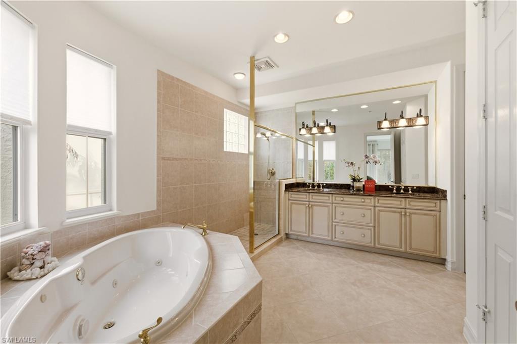 Jetted tub with great sunlight & dual sinks