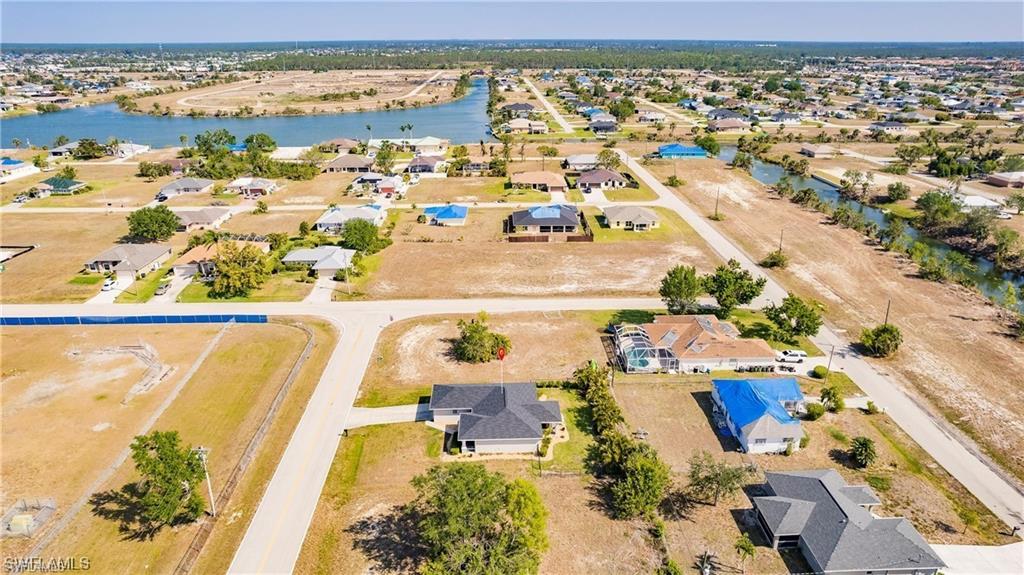 Aerial view of residential area with a nearby body of water