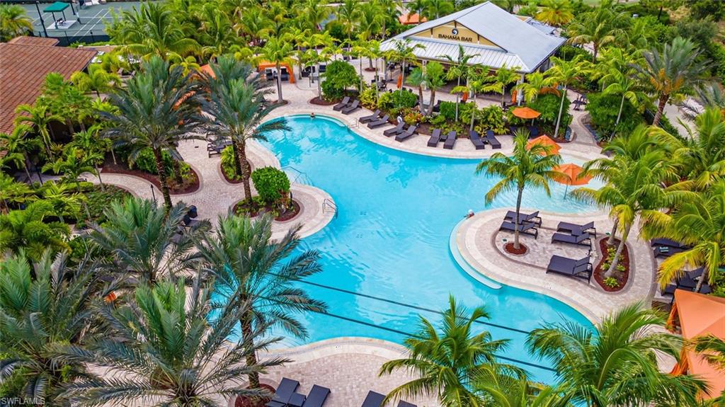 Community pool with a patio