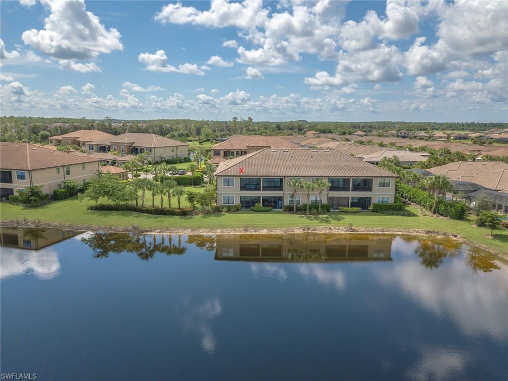 Water view featuring nearby suburban area