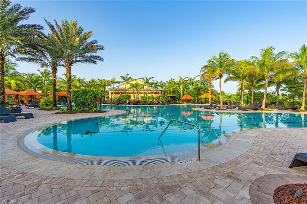 Community pool featuring a patio area