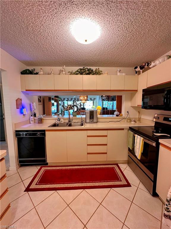 Kitchen featuring pass through to dining area