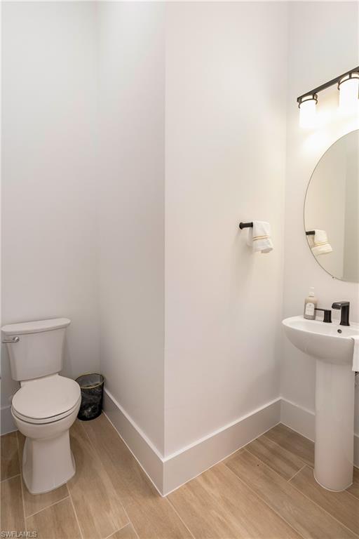 Bathroom featuring wood tiled floors