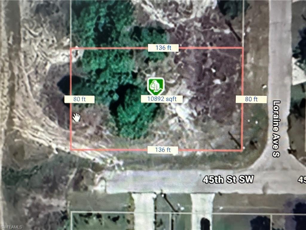 Aerial view of property's location with property parcel outlined