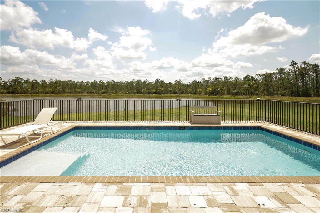 Lakeside large pool-property goes beyond the fence to the lake.