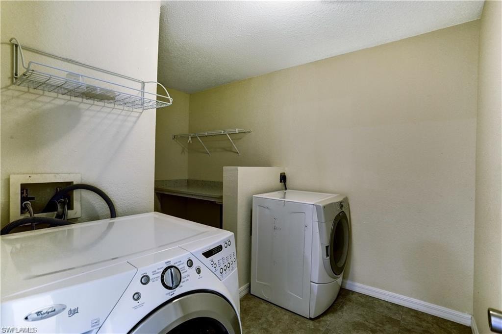 Huge UPSTAIRS laundry room with folding station. A dream laundry room!