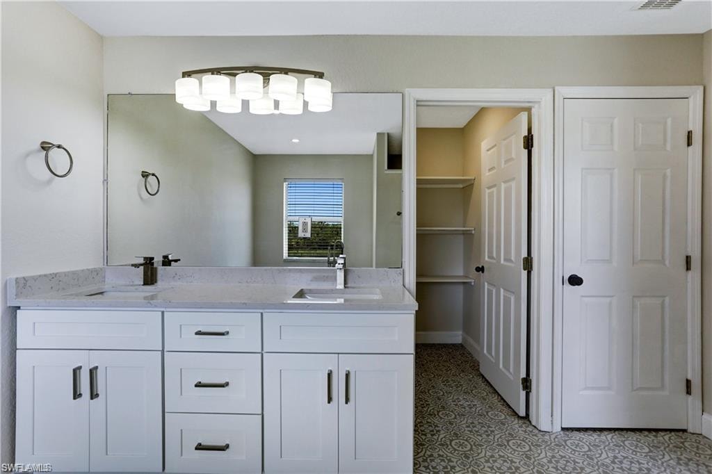 Additional large storage closet in bathroom plus a linen closet.