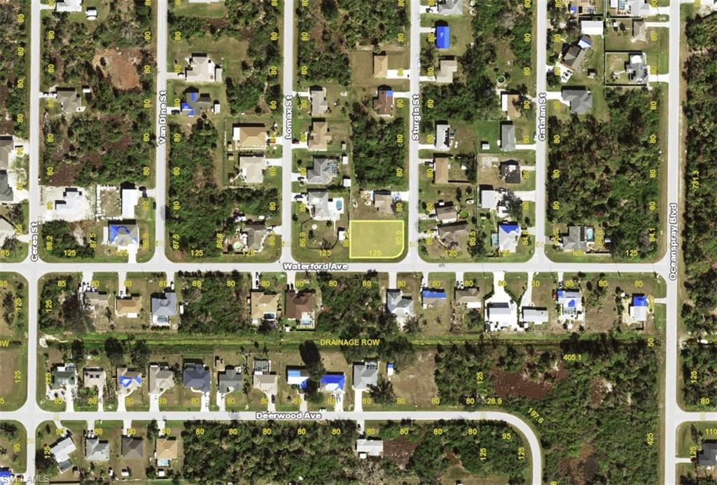 Aerial map of property and surrounding area featuring property parcel outlined