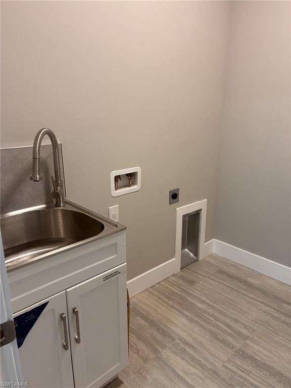 Bathroom featuring enclosed toilet.