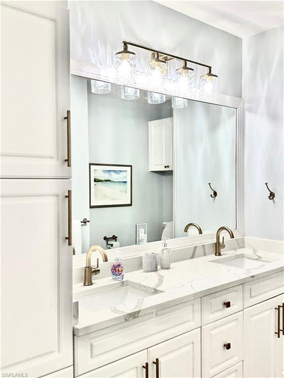 Bathroom featuring double vanity