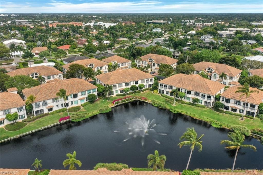 Aerial view of residential area with a large body of water