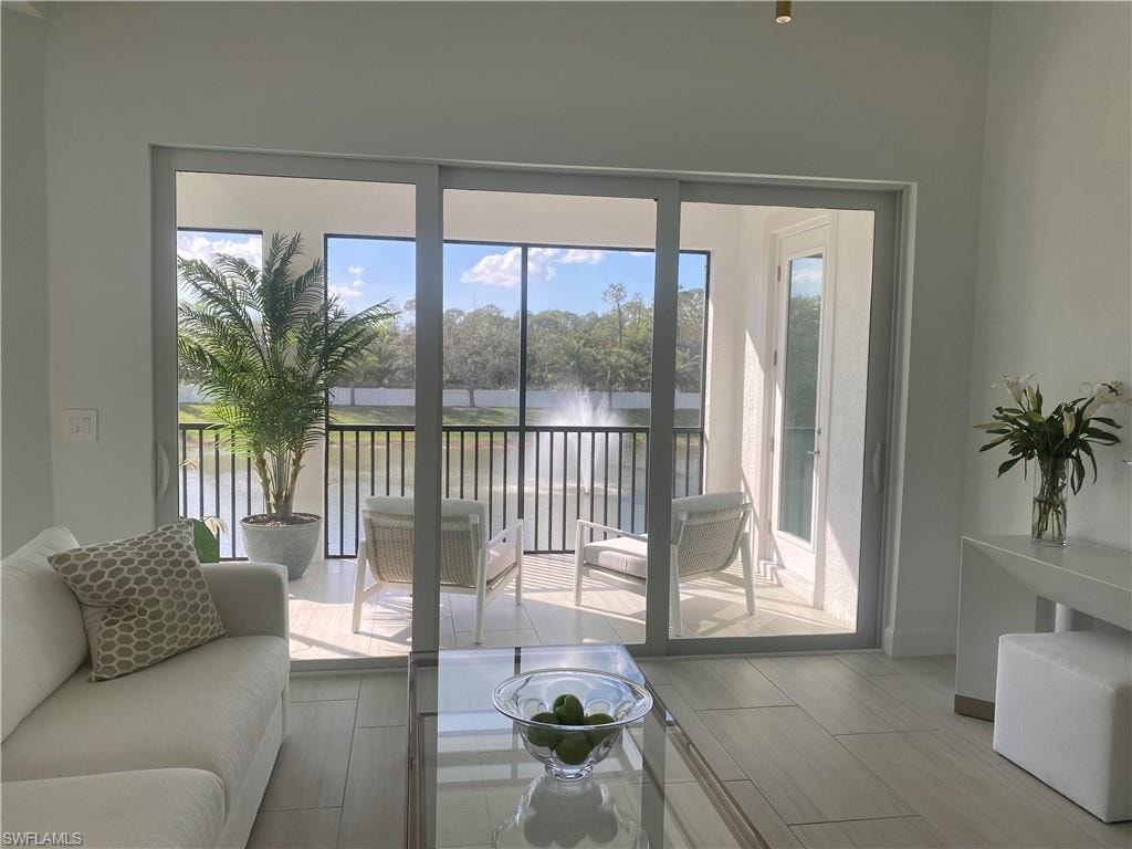 Slider To Outside Area With Fountain and Lake