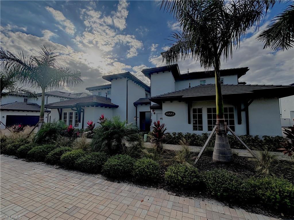 View of front of property featuring stucco siding