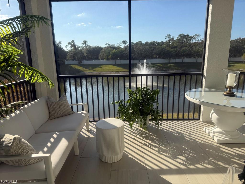 Outside screen lanai featuring plenty of natural light and a water view
