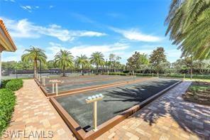 View of property's community featuring a game area