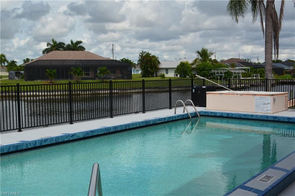 Community pool with a water view