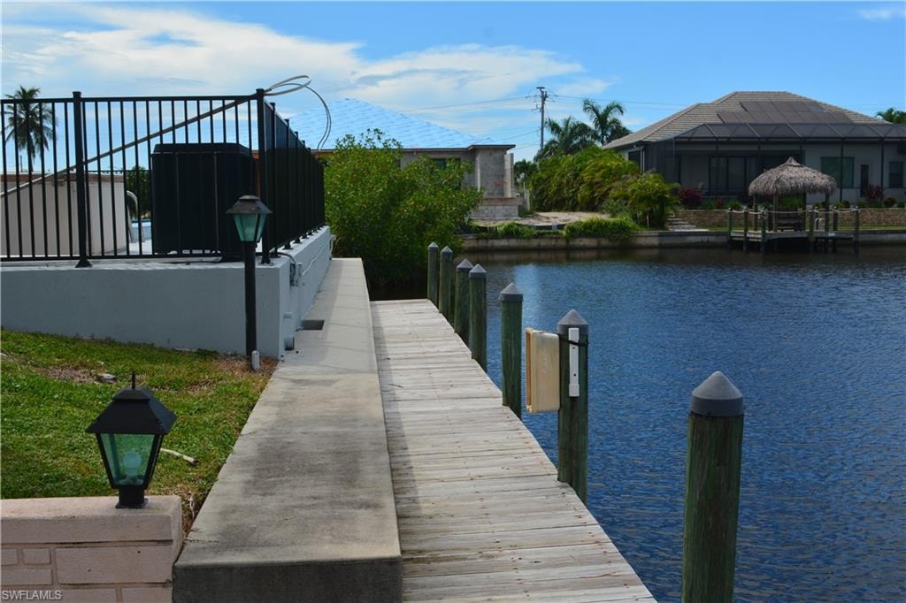Dock featuring a water view