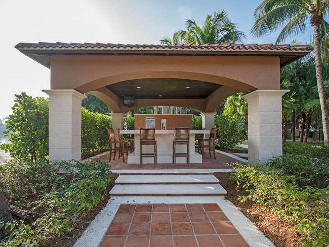 Doorway to property featuring a bar