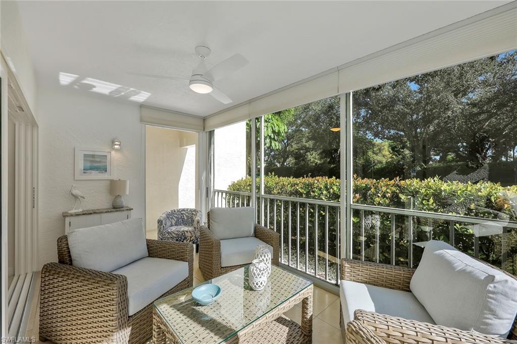 Sunroom with an outdoor hangout area and ceiling fan