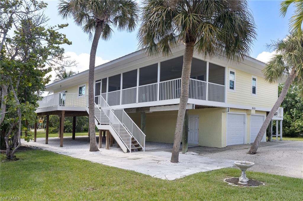 Front Elevation - Beautiful Near Beach  Property with HUGE Screened Lanai