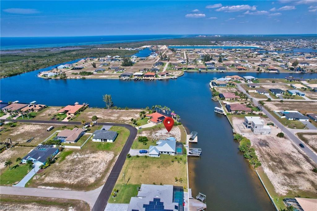 Aerial view of residential area with a large body of water