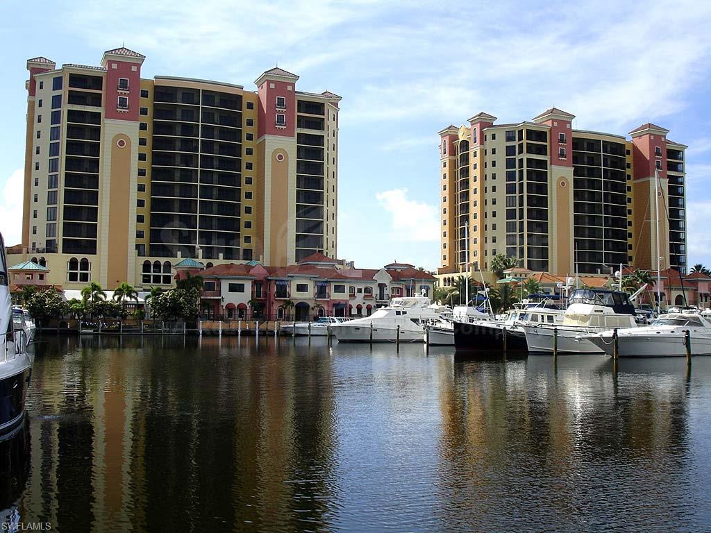 View of property with a water view