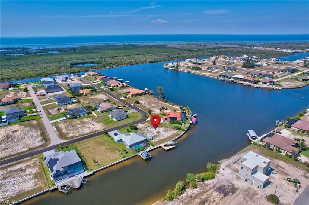 Aerial view of residential area with a nearby body of water