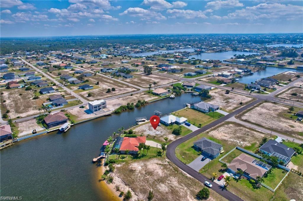 Aerial view of residential area with a nearby body of water