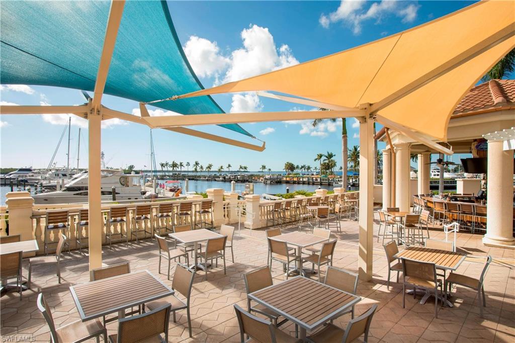 View of patio featuring view of marina