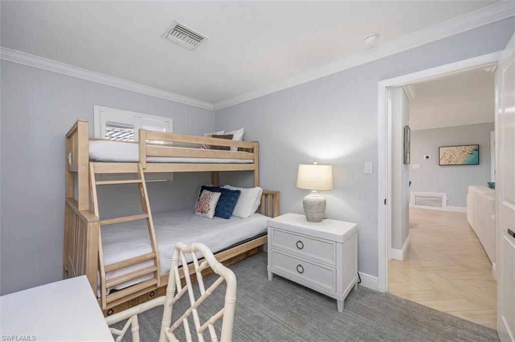 Third Bedroom with a Bunk that has a Fulli size bed on the bottom and a twin on the top.