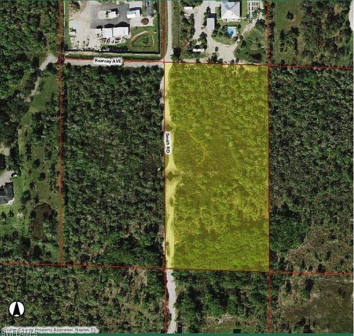Aerial map of property and surrounding area featuring property parcel outlined