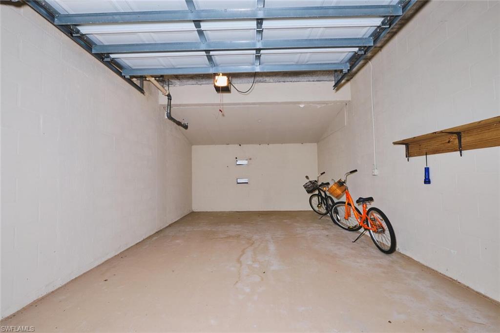 Garage featuring a garage door opener